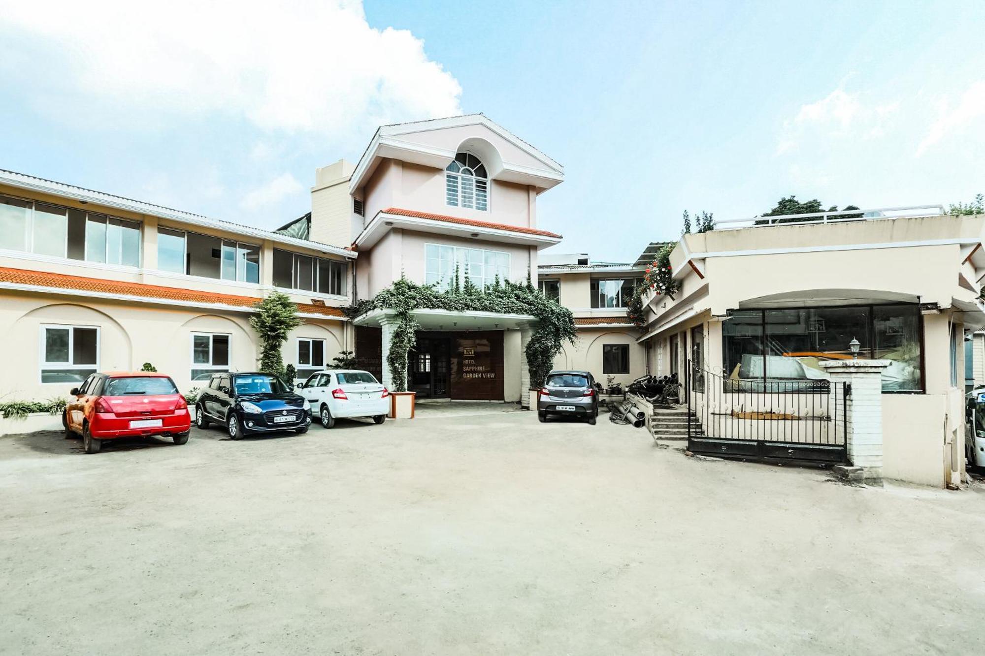 Capital O 13231 Hotel Sapphire Garden View Ooty Bagian luar foto